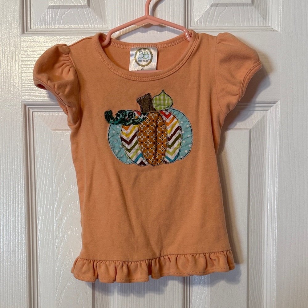 Pumpkin Embroidered orange ruffle shirt